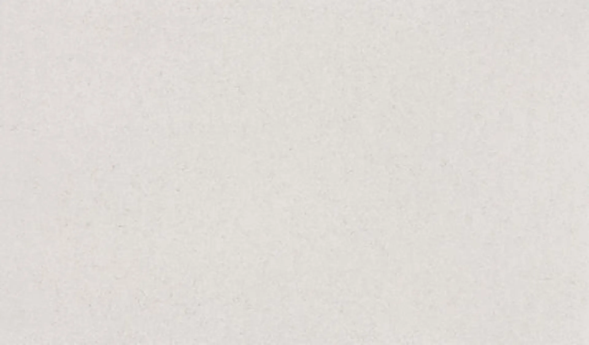 Closeup image of ONE Quartz Surfaces Golden Gate White Quartz countertop slab