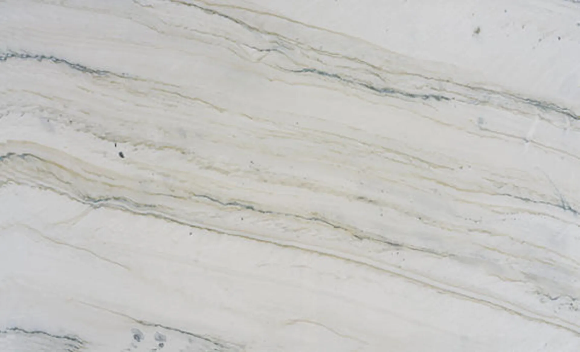 Closeup image of Sereno Cream Quartzite countertop slab