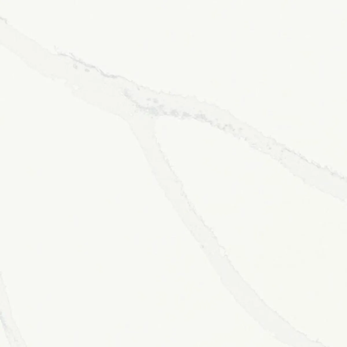 Closeup image of ONE Quartz Surfaces Statuary Unity White Quartz countertop slab