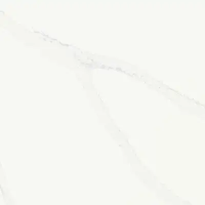 Closeup image of ONE Quartz Surfaces Statuary Unity White Quartz countertop slab