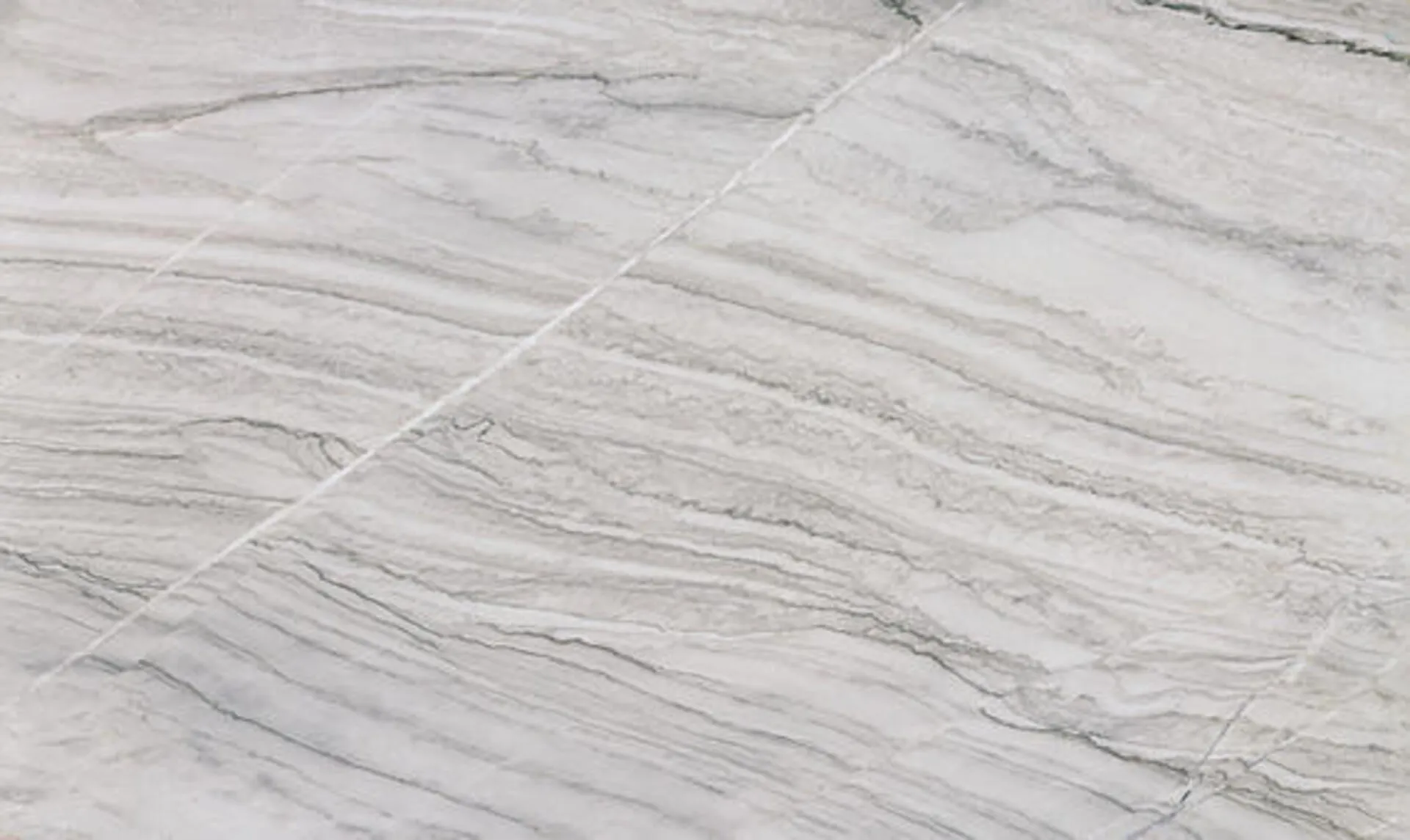 Closeup image of White Pearl White Quartzite countertop slab