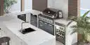 Image of installed White Pearl White Quartzite countertops