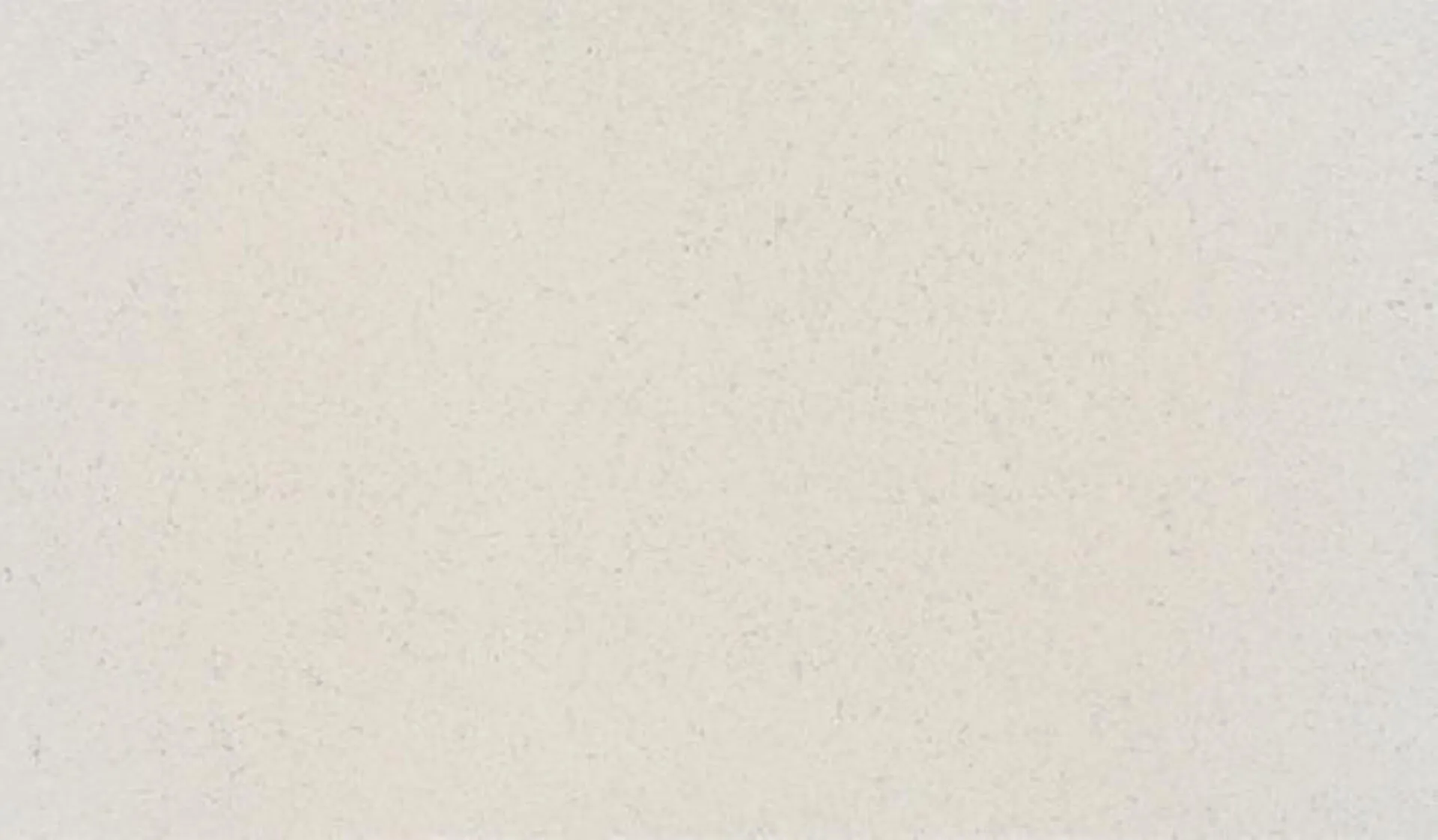 Closeup image of ONE Quartz Surfaces Rocky Mountain Cream Quartz countertop slab