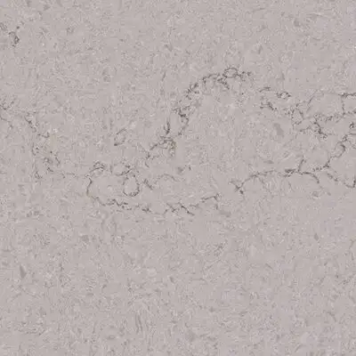 Closeup image of ONE Quartz Surfaces Calacatta Odyssey Cream Quartz countertop slab