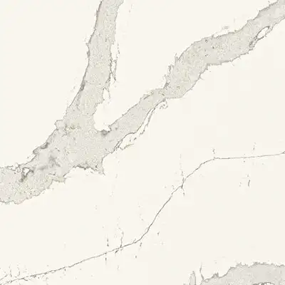 Closeup image of ONE Quartz Surfaces Calacatta Wisteria White Quartz countertop slab