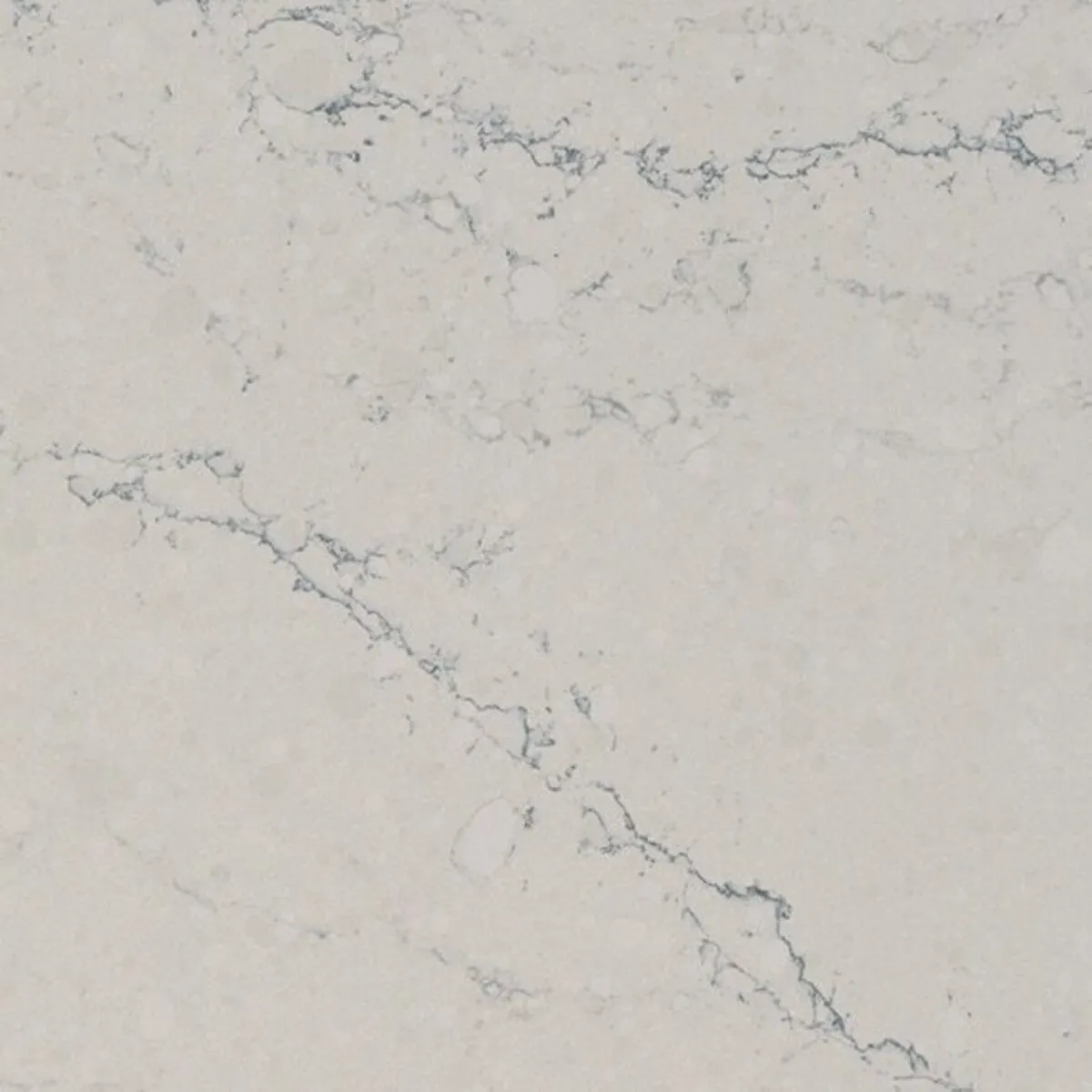 Closeup image of ONE Quartz Surfaces Washington Cream Quartz countertop slab