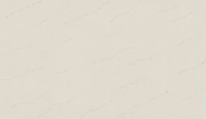 Closeup image of ONE Quartz Surfaces Carrara Veil Cream Quartz countertop slab