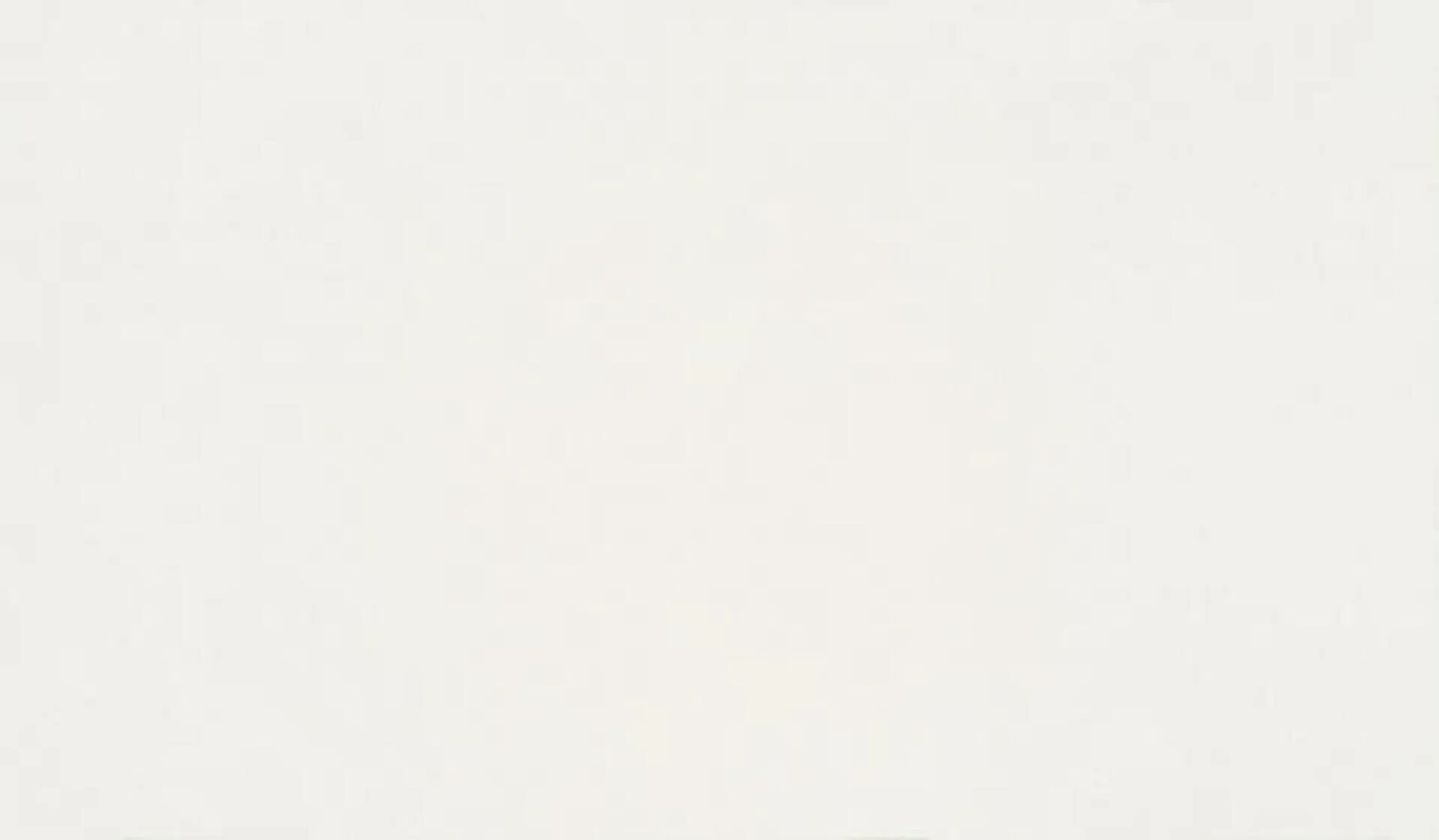 Closeup image of ONE Quartz Surfaces White Sand White Quartz countertop slab