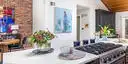 Image of installed ONE Quartz Surfaces White Sand White Quartz countertops