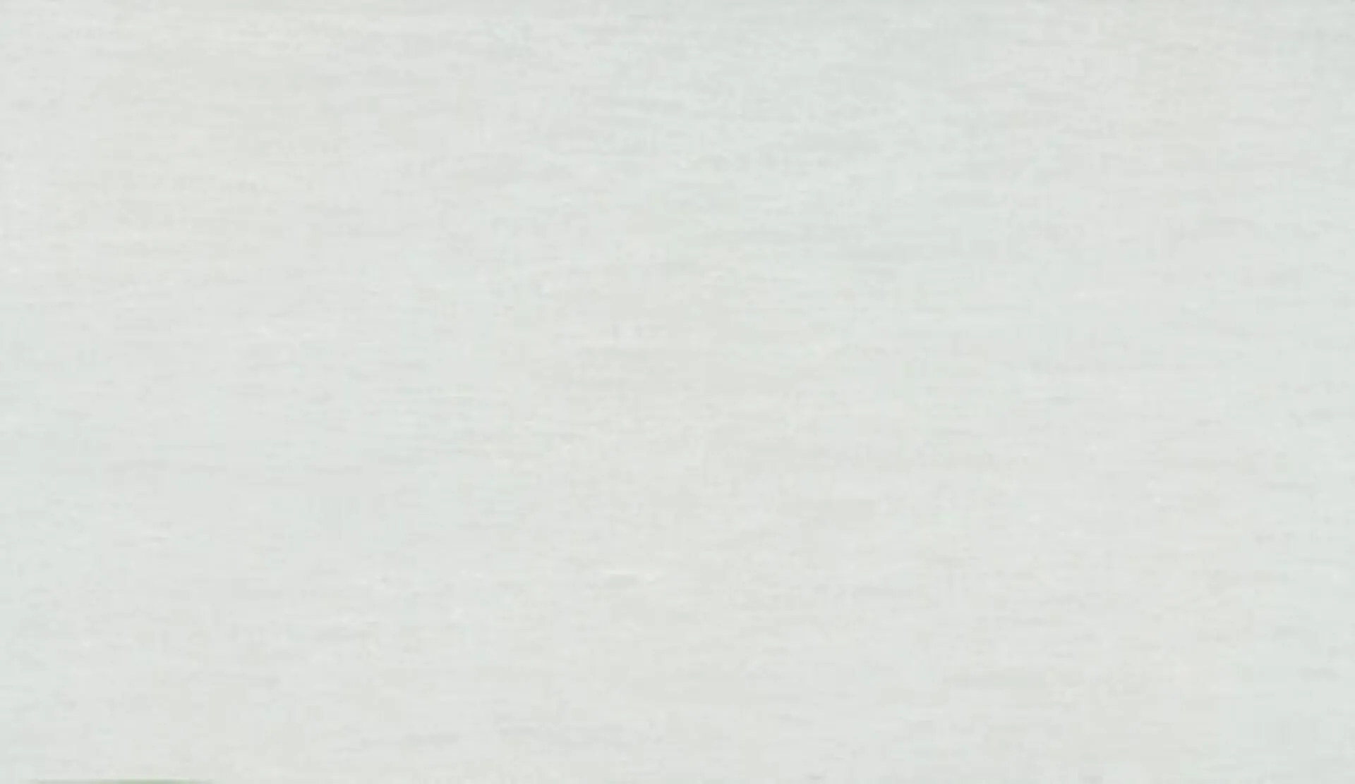 Closeup image of ONE Quartz Surfaces Juneau White Quartz countertop slab