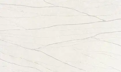 Closeup image of ONE Quartz Surfaces Monument White Cream Quartz countertop slab