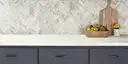 Image of installed ONE Quartz Surfaces Liberty Gold Cream Quartz countertops