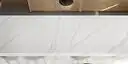 Image of installed ONE Quartz Surfaces Independence Calacatta White Quartz countertops