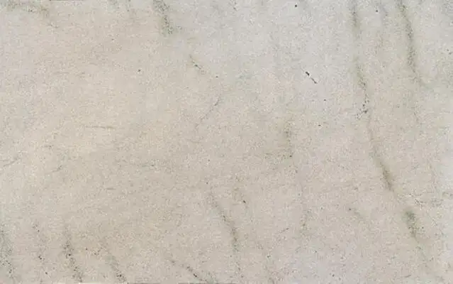 Closeup image of White Fantasy Beige Granite countertop slab