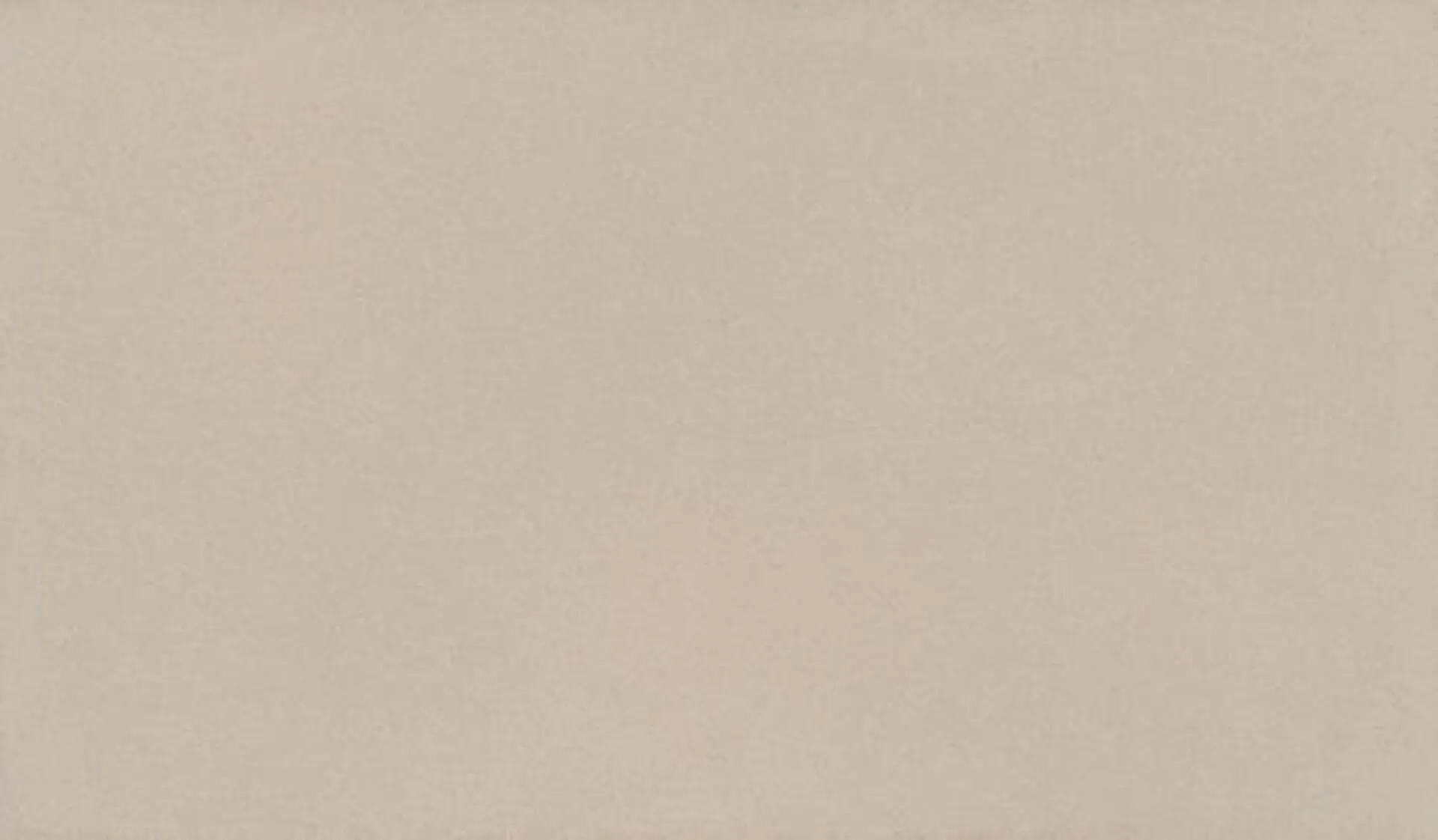 Closeup image of ONE Quartz Surfaces Simply Beige Beige Quartz countertop slab