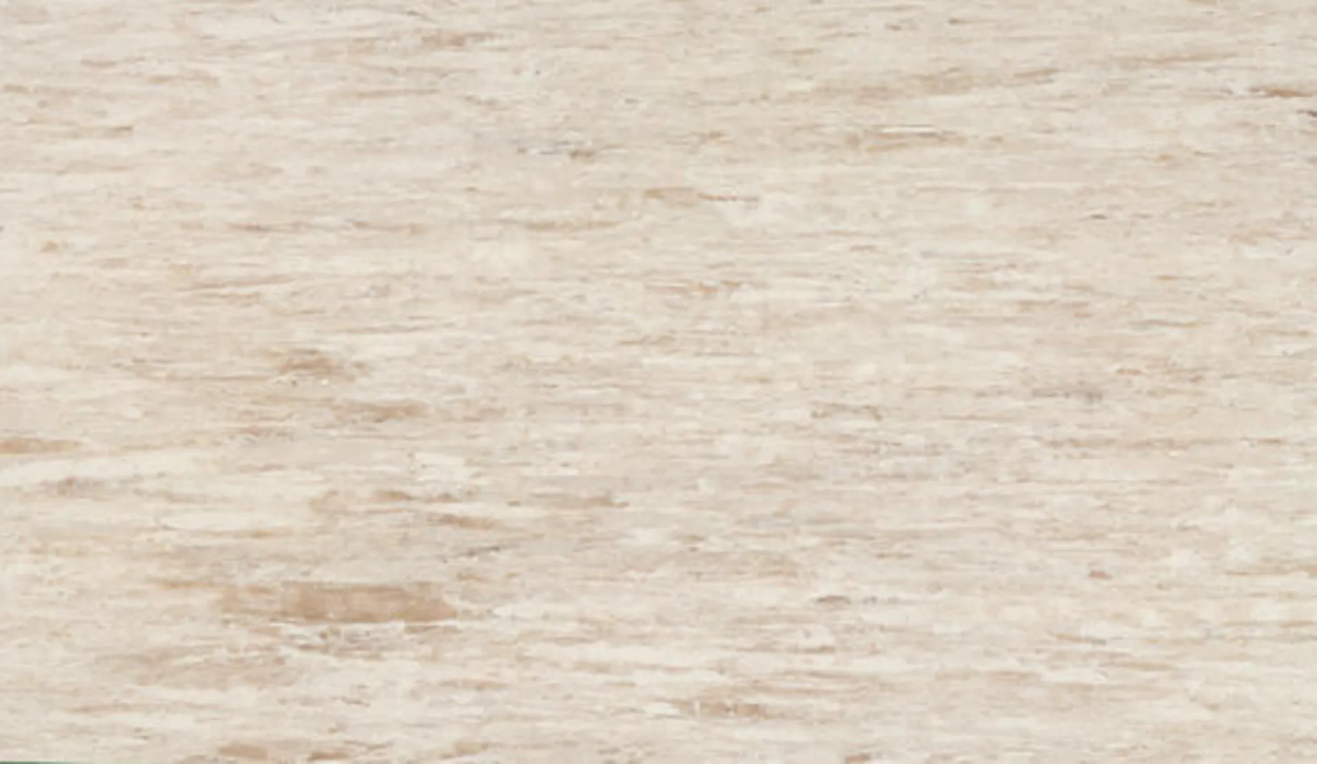 Closeup image of ONE Quartz Surfaces Sedona Beige Quartz countertop slab