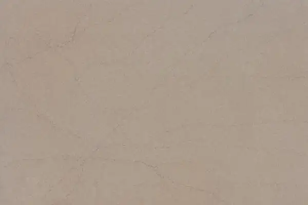 Closeup image of ONE Quartz Surfaces Capitol Beige Beige Quartz countertop slab