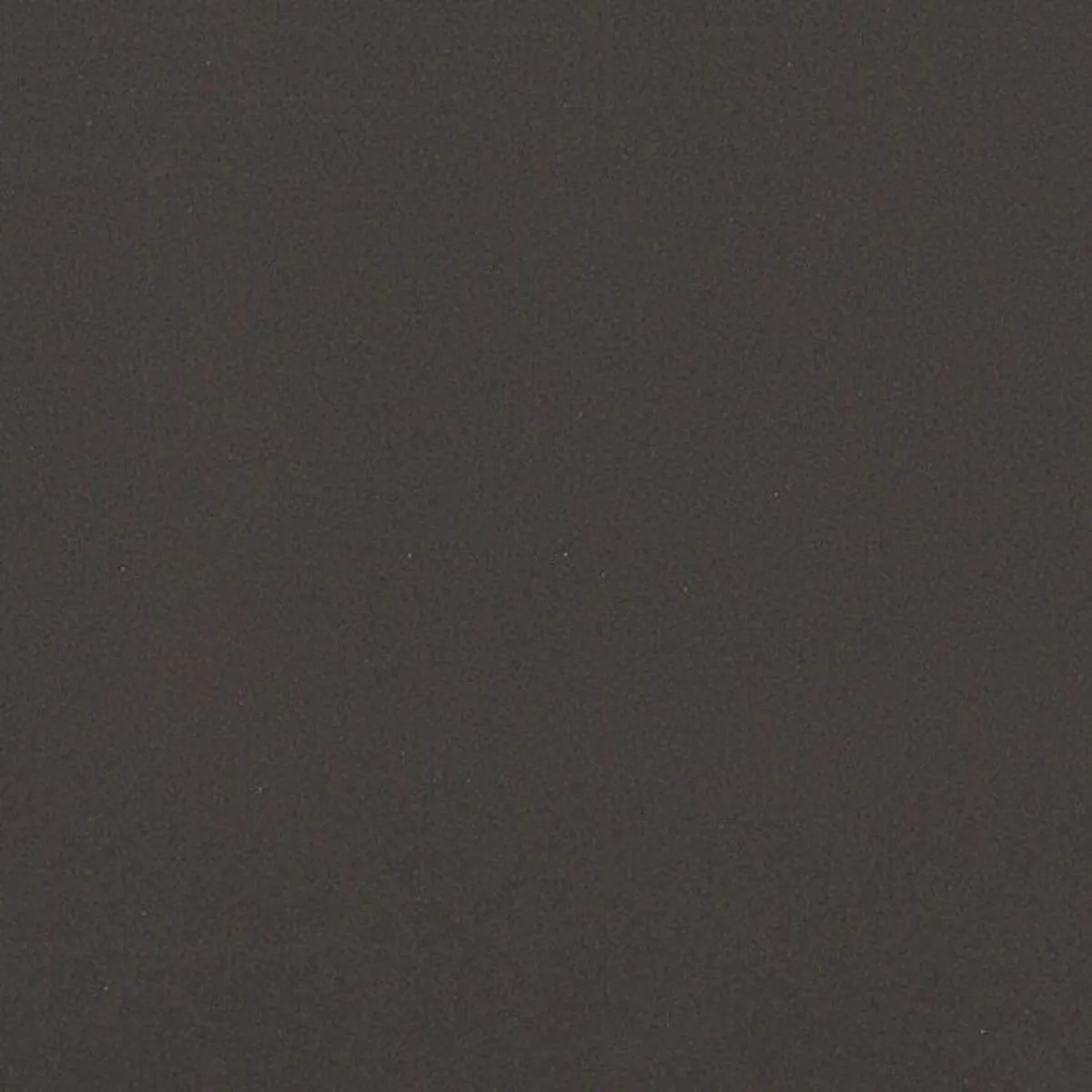 Closeup image of ONE Quartz Surfaces Concrete Grey Black Quartz countertop slab