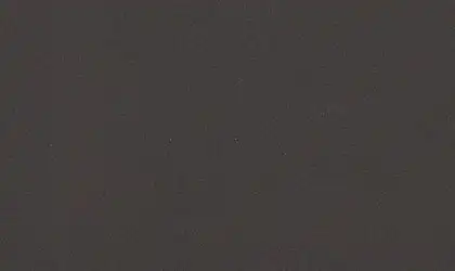 Closeup image of ONE Quartz Surfaces Concrete Grey Black Quartz countertop slab