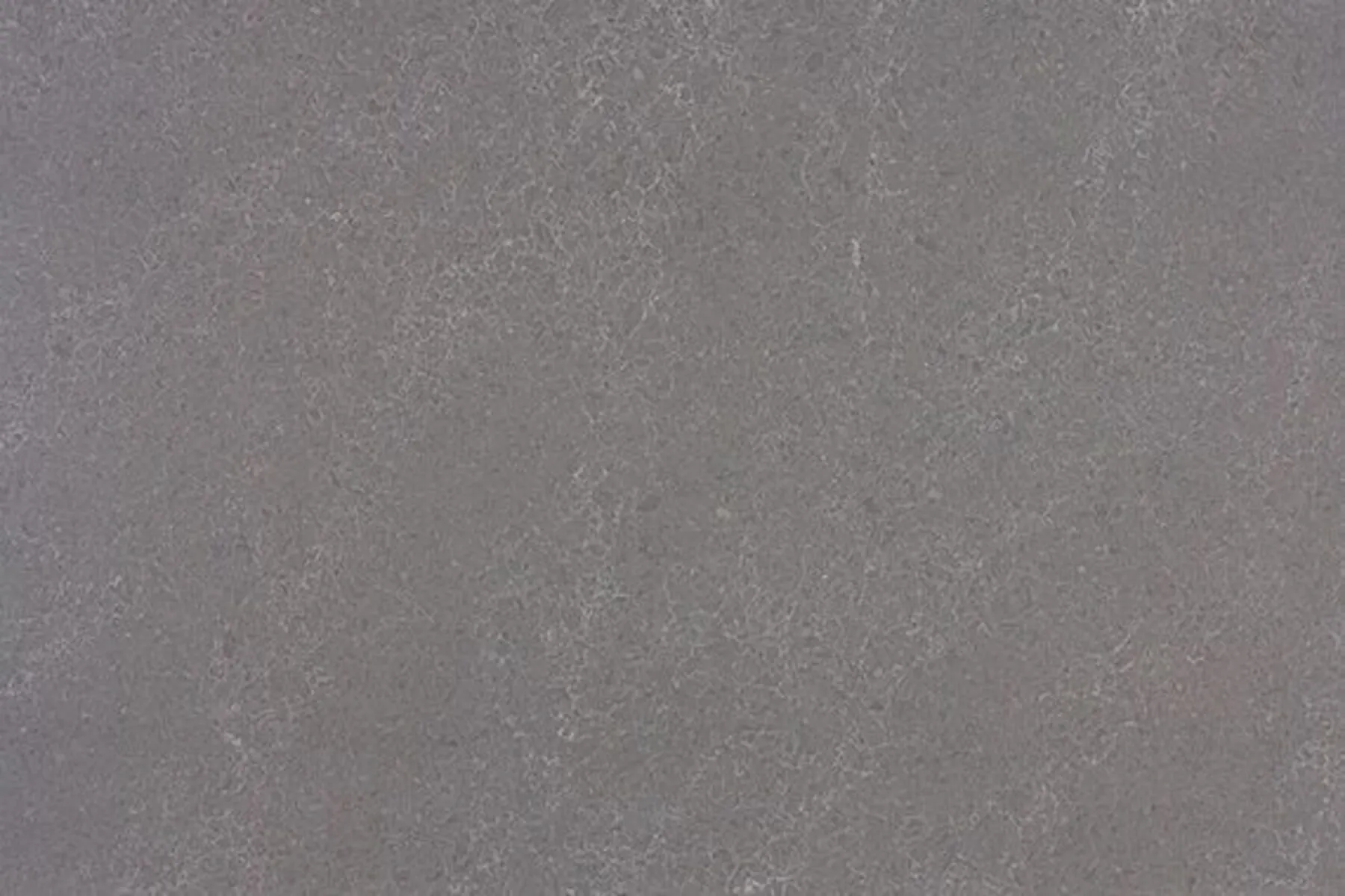 Closeup image of ONE Quartz Surfaces Armor Grey Grey Quartz countertop slab
