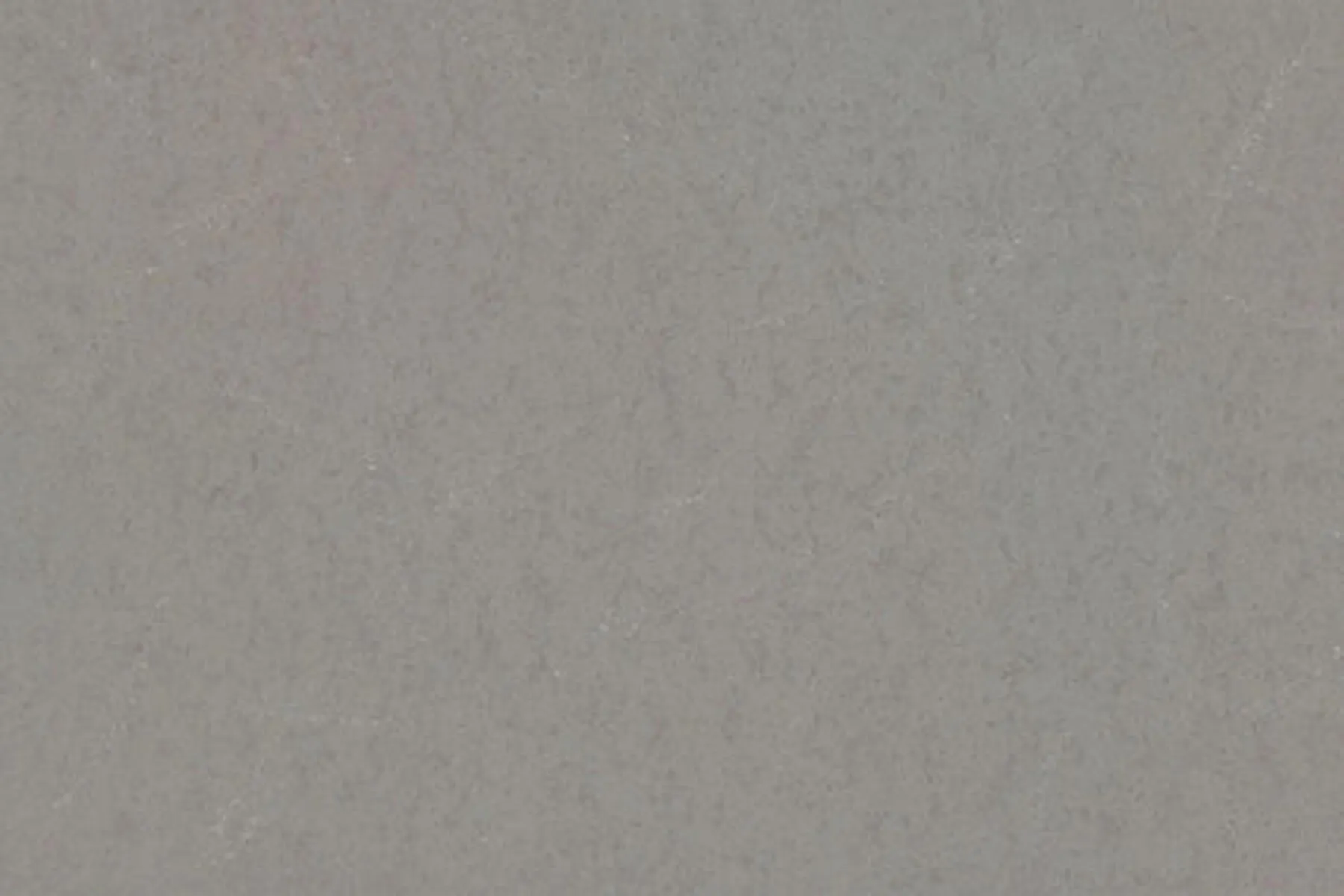 Closeup image of ONE Quartz Surfaces Pulsar Grey Quartz countertop slab