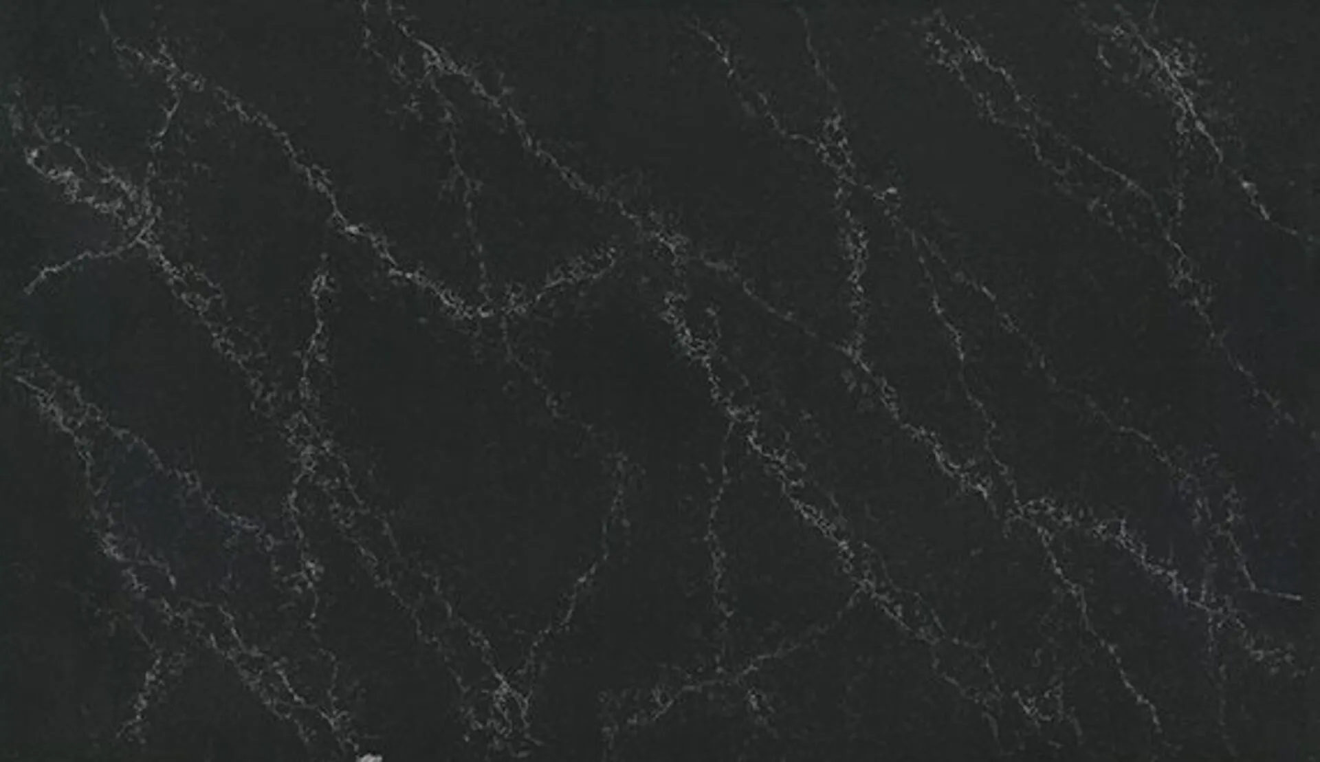 Closeup image of ONE Quartz Surfaces Liberty Black Black Quartz countertop slab
