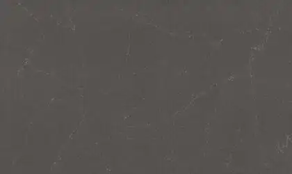 Closeup image of ONE Quartz Surfaces Sirius Grey Quartz countertop slab