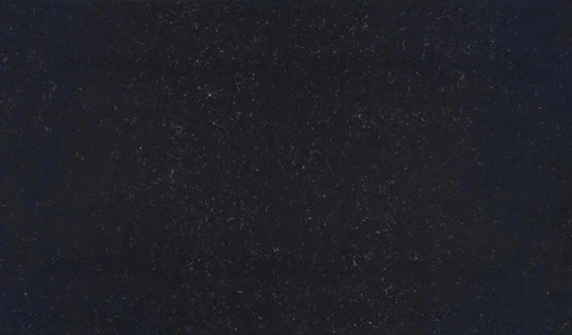 Closeup image of ONE Quartz Surfaces Nightfall Black Quartz countertop slab