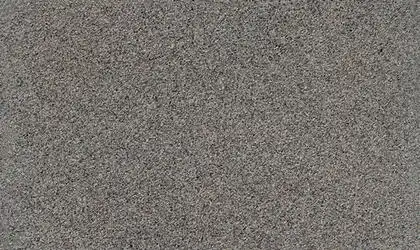 Closeup image of New Caledonia Brown Granite countertop slab