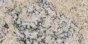 Closeup image of White Ice Beige Granite countertop slab