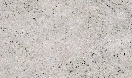 Closeup image of Cotton White Beige Granite countertop slab