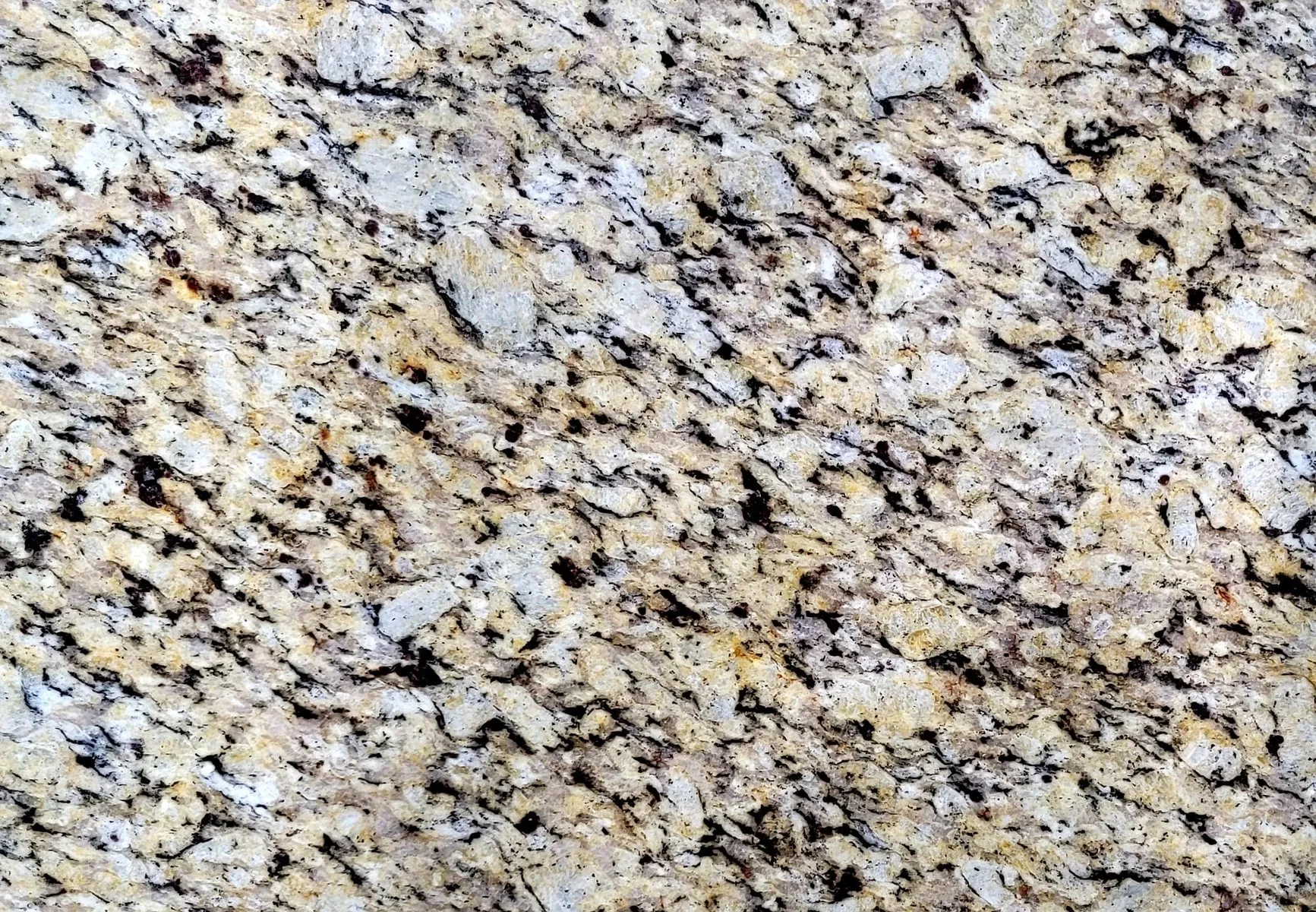Closeup image of Santa Cecilia Classic Beige Granite countertop slab
