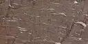 Closeup image of Cygnus Brown Granite countertop slab