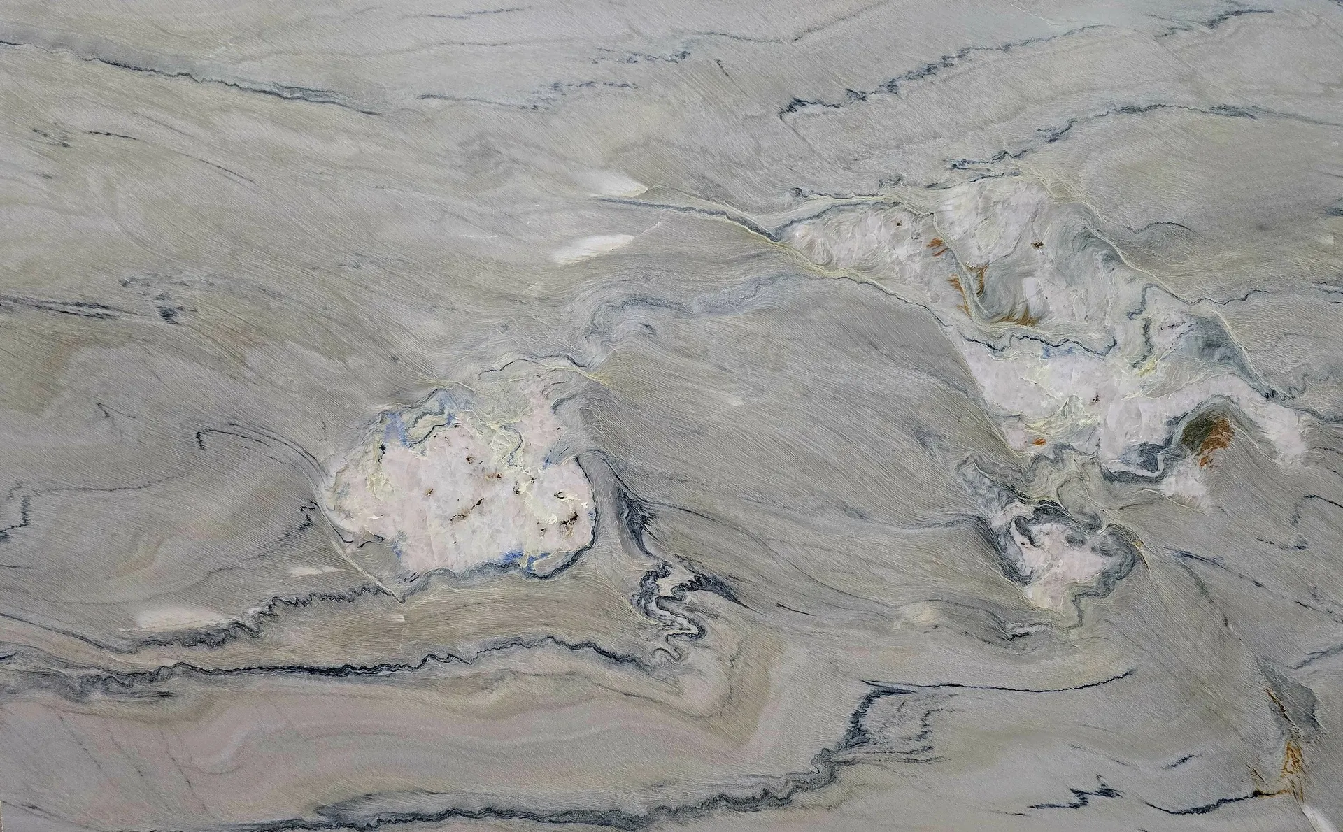 Closeup image of Fantasy Macaubas Grey Quartzite countertop slab