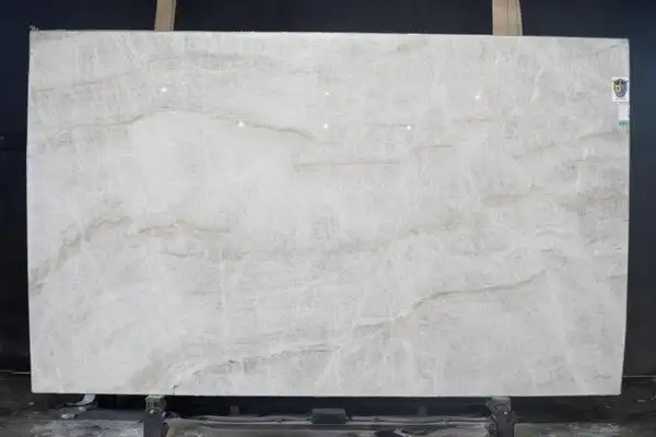 Closeup image of Venus (Taj Mahal 1st Choice) Cream Quartzite countertop slab