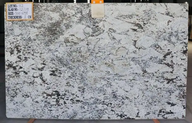 Closeup image of White Nuvo 1st Choice White Granite countertop slab
