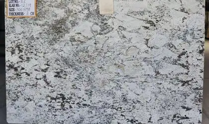 Closeup image of White Nuvo 1st Choice White Granite countertop slab Stone Countertop