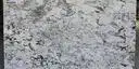 Closeup image of White Nuvo 1st Choice White Granite countertop slab