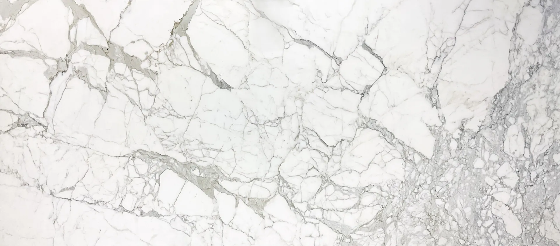 Closeup image of Calacatta Oro White Marble countertop slab