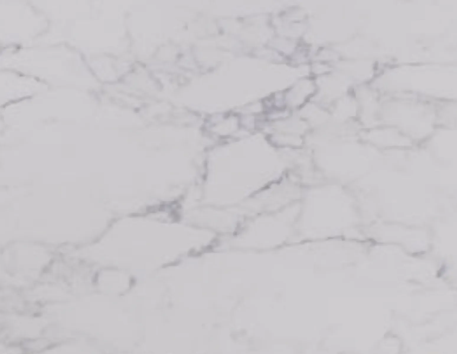 Closeup image of Stratus Quartz Arabescato Vagli White Quartz countertop slab