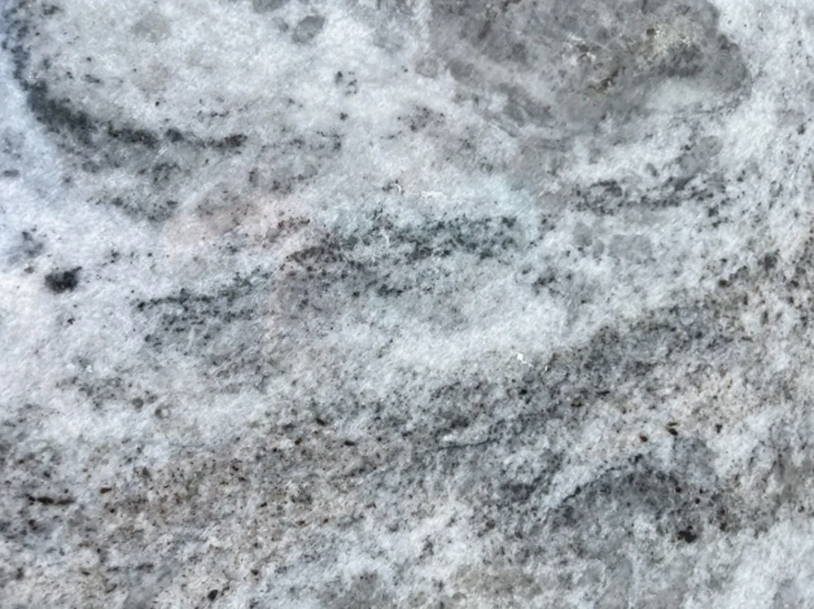 Closeup image of CRS Quartz River Blue Blue Marble countertop slab