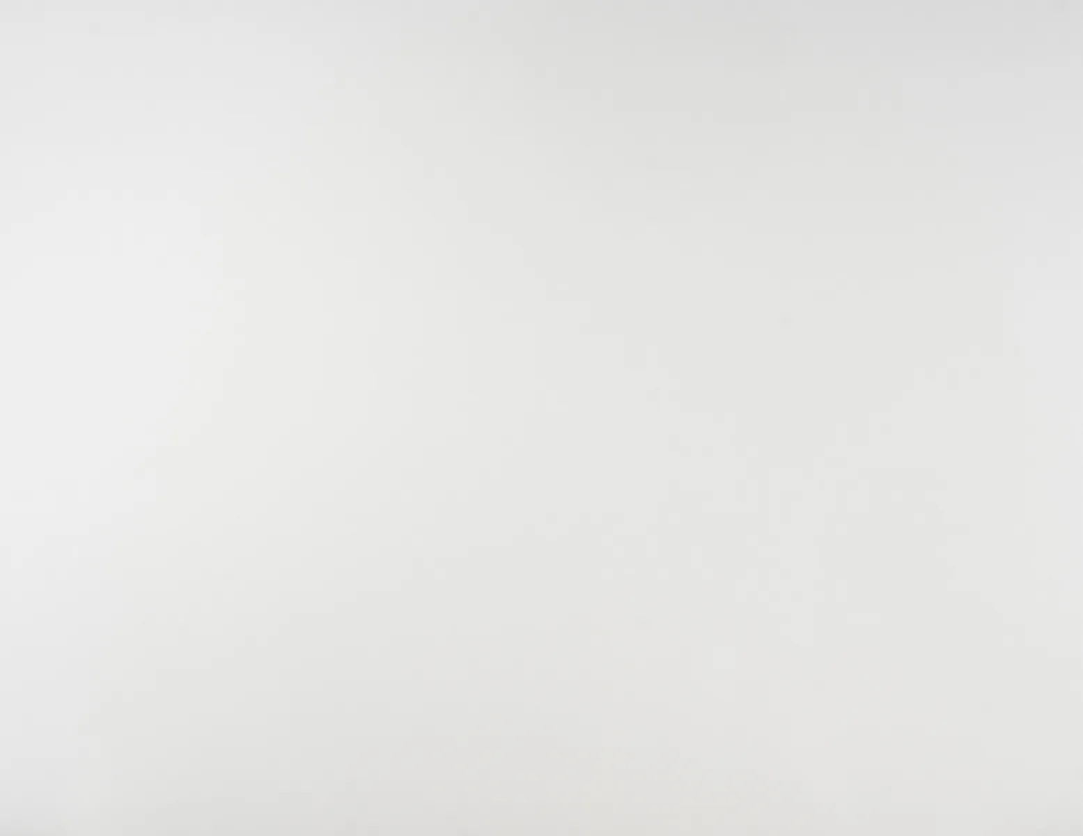 Closeup image of Absolute White White Quartz countertop slab