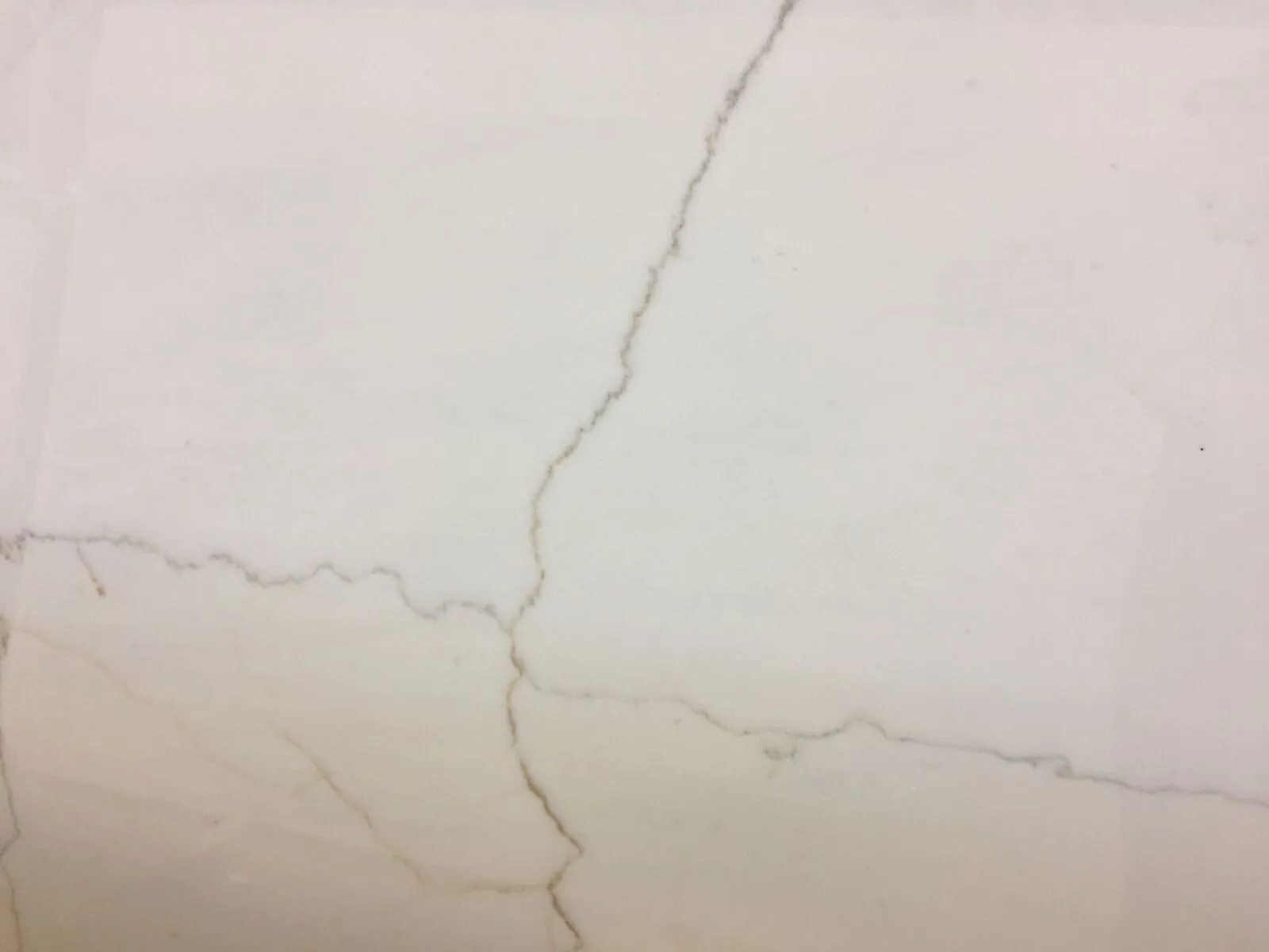 Closeup image of Calacatta Lincoln White Marble countertop slab