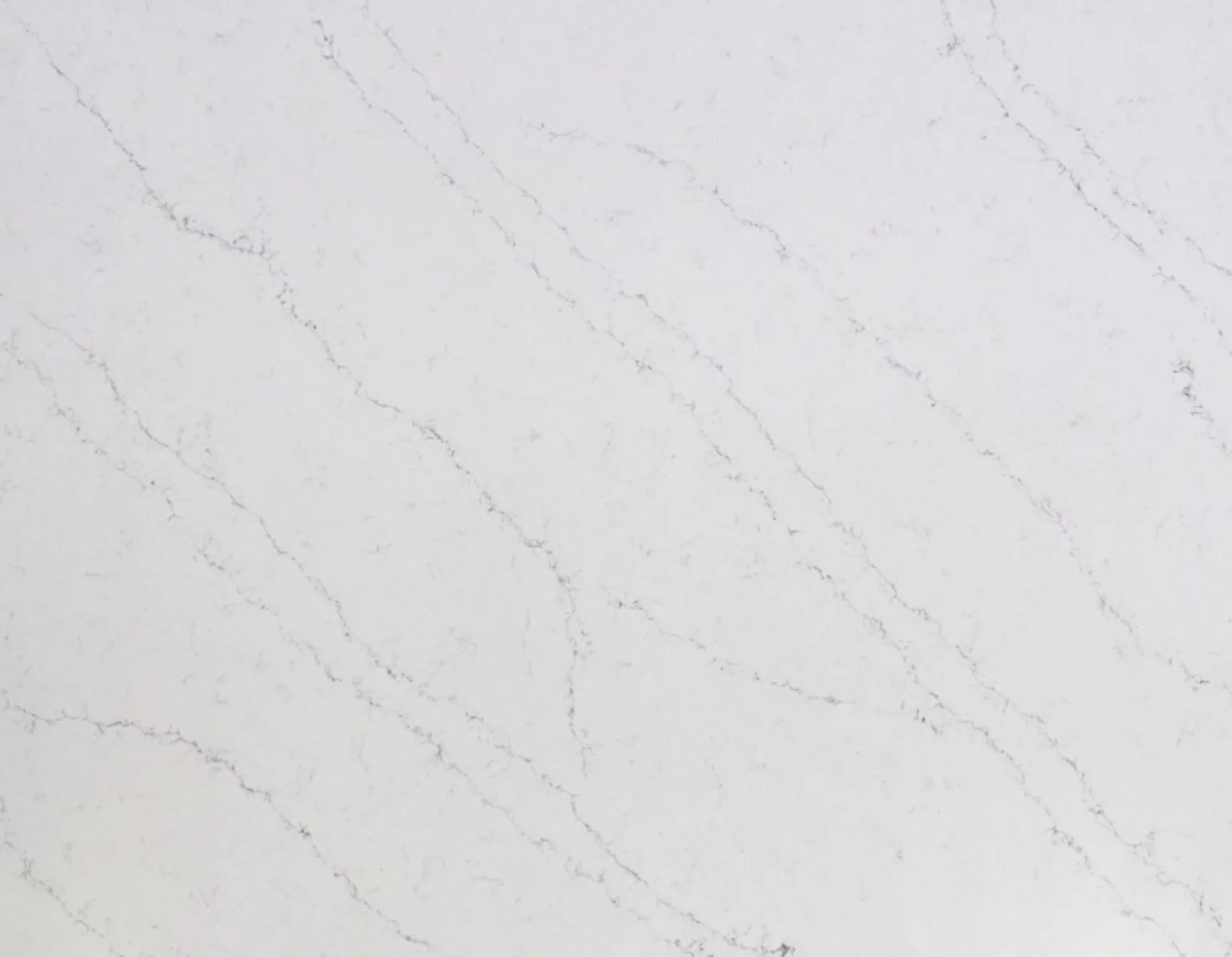 Closeup image of Acadia White Quartz countertop slab