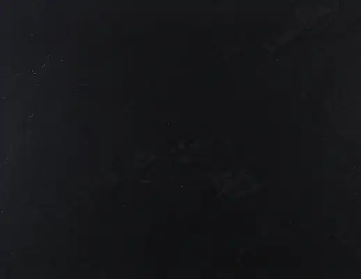 Closeup image of Mist Black Black Granite countertop slab