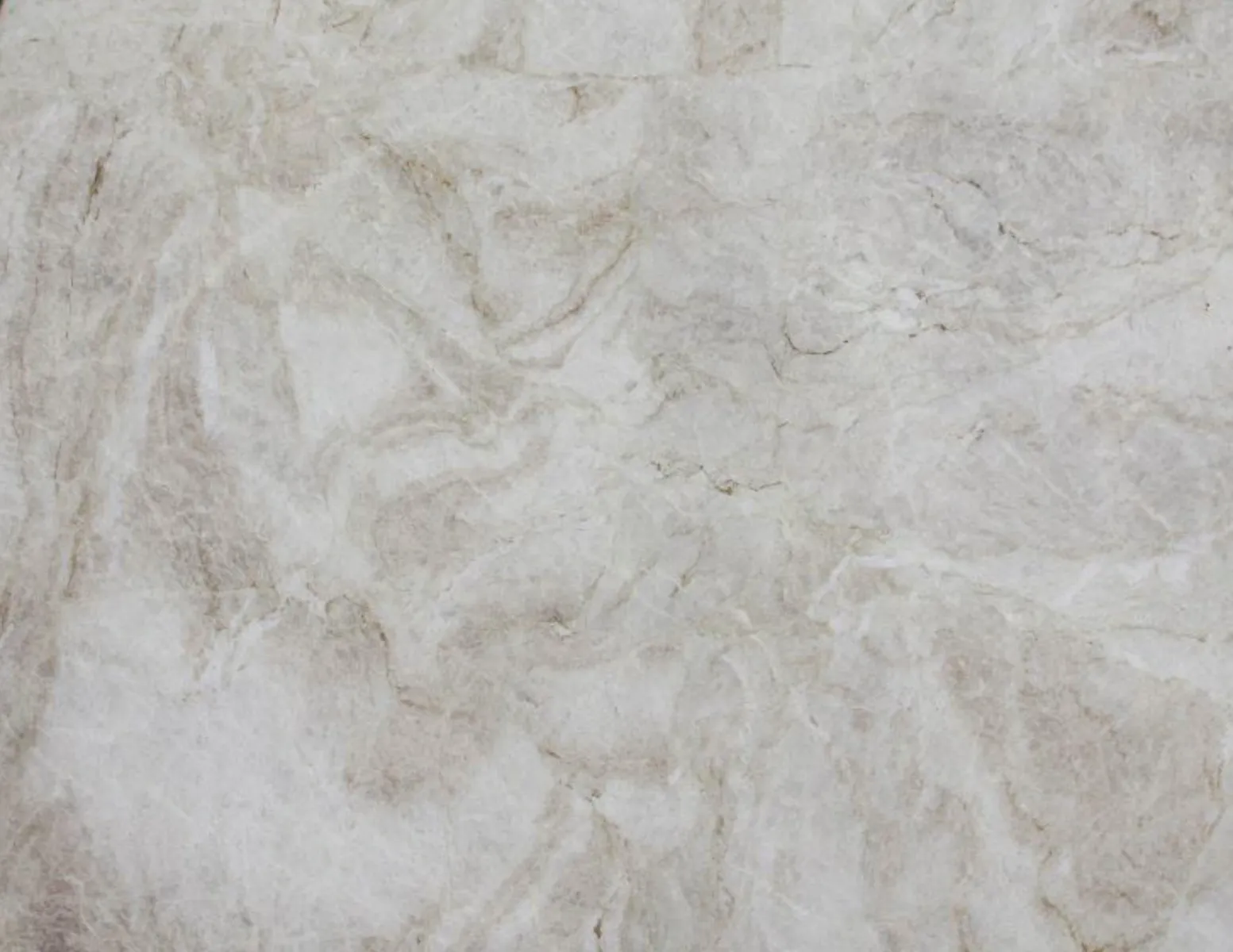 Closeup image of Taj Mahal Premium Cream Quartzite countertop slab
