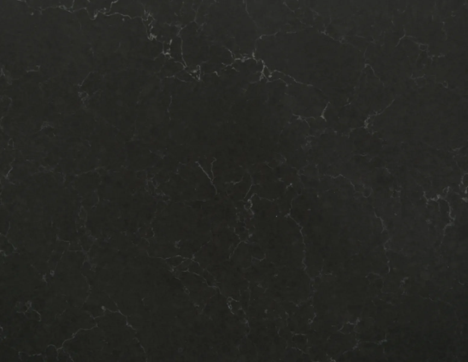 Closeup image of Vicostone Cinza Black Quartz countertop slab
