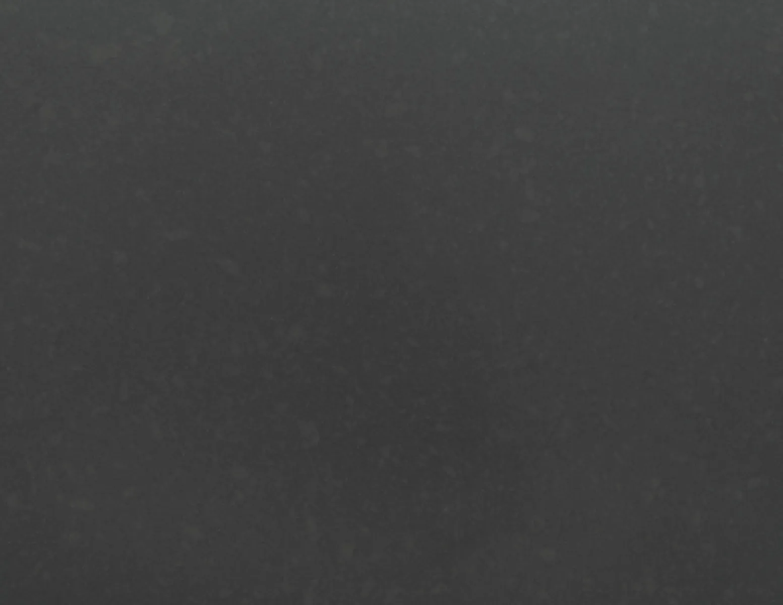Closeup image of Vicostone Graphite Black Quartz countertop slab