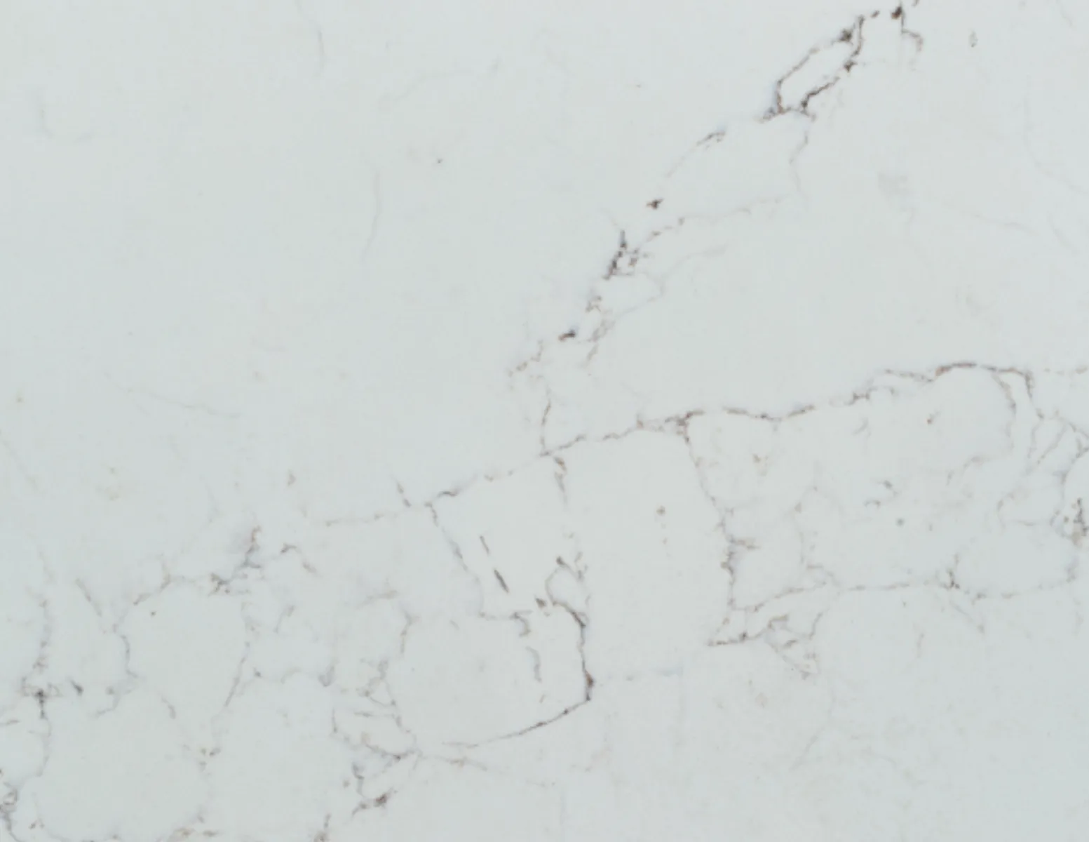 Closeup image of Vicostone Statuario White Quartz countertop slab