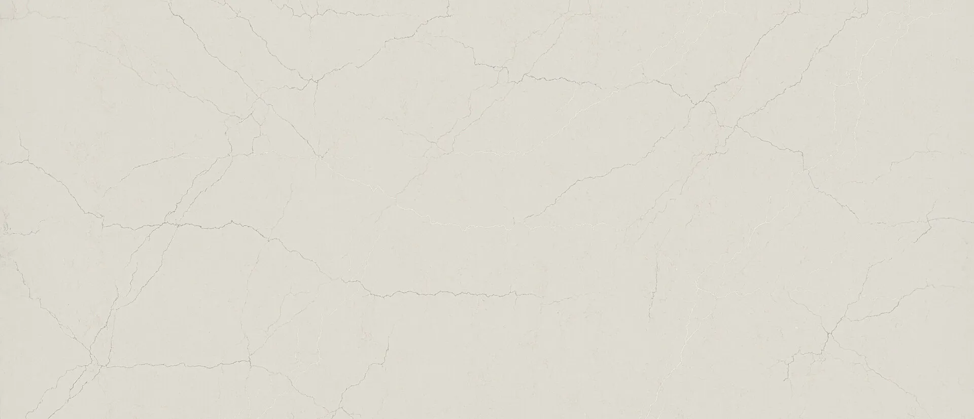 Closeup image of Q Quartz Miraggio Taj Honed Cream Quartz countertop slab
